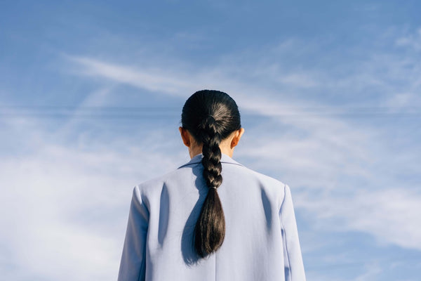 Woman with a tight ponytail that can cause Traction alopecia