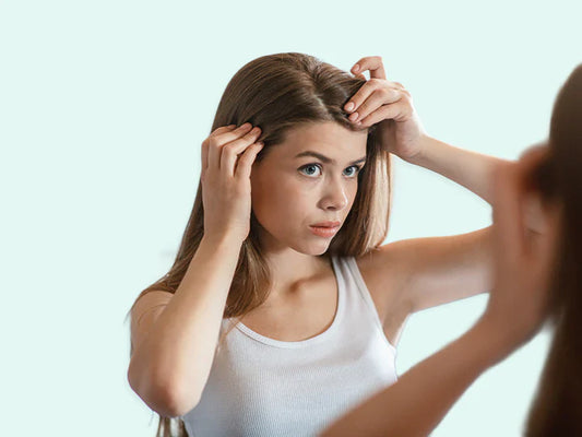Why can I see my scalp through my hair?
