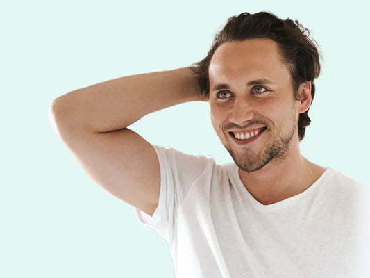 Person touching his hair 