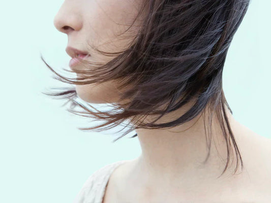 Women with hair blowing in the wind