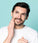 Man applying neofollics beard growth stimulating serum