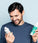 Man holding neofollics hair growth stimulating conditioner
